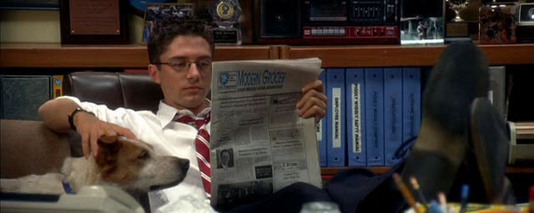 Pete Monash reading the paper